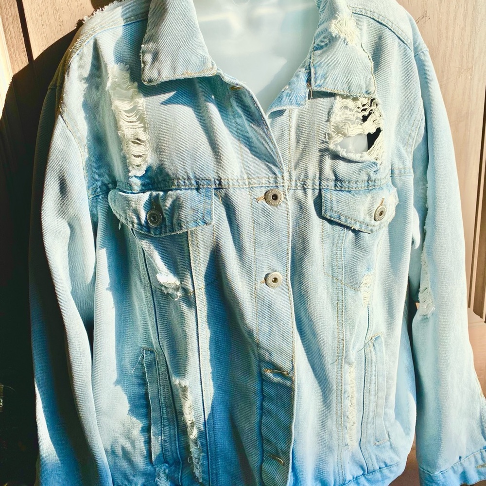 Distressed denim jacket